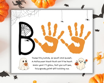 May include: A white Halloween-themed print with orange handprints and the word "Boo" in black. The print includes a poem and illustrations of ghosts and pumpkins, surrounded by Halloween decorations.