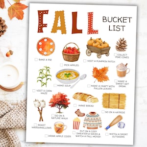 May include: A watercolor-style "Fall Bucket List" print featuring autumn-themed activities. The list includes baking a pie, visiting a pumpkin patch, making soup, and more. The title "FALL" is in large, colorful letters.
