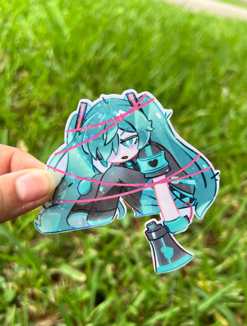 May include: A sticker featuring a teal-haired anime character with a black and teal outfit, pink accents, and a megaphone. The character is sitting with pink lines around them.