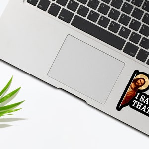 May include: A sticker featuring a picture of Jesus peeking around a corner with the text "I SAW THAT!" printed below.