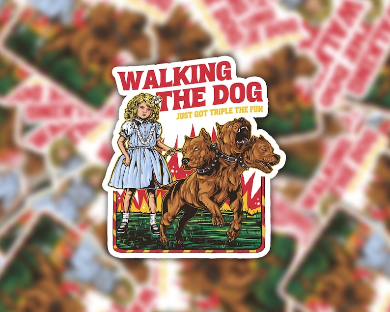 May include: A sticker featuring a cartoon girl walking a three-headed dog. The text reads "Walking the Dog" and "Just got triple the fun".