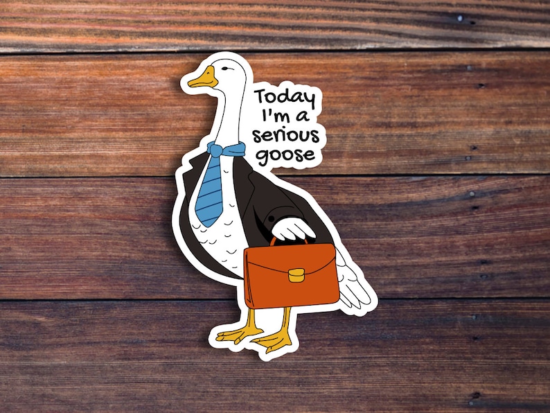May include: A white goose wearing a black suit and blue tie, holding a brown briefcase. The goose has the text "Today I'm a serious goose" written above it.