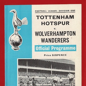 May include: A black and white programme for a Tottenham Hotspur vs. Wolverhampton Wanderers football match. The programme cover features the Tottenham Hotspur team crest, a black and white photo of a football match, and the text "Official Programme" and "Price SIXPENCE". The programme is for the 1969-70 season, volume 62, number 14. The match is scheduled for Saturday, 11th October, 1969, with a kick-off time of 3 p.m.