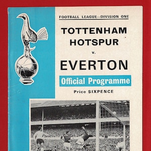 May include: A vintage programme for a Tottenham Hotspur vs. Everton football match. The programme features a black and white photo of a goal being scored, the team logos, and the date Saturday, 8th March, 1969.