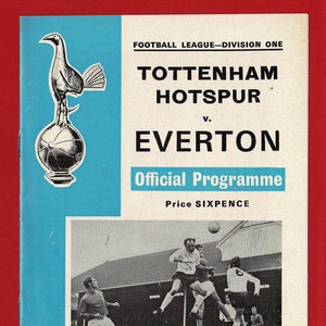 May include: A black and white photograph of a football match between Tottenham Hotspur and Everton. The match took place on Wednesday, 17th December, 1969. It was part of the 1969-70 Football League Division One season. The match was played at White Hart Lane, the home of Tottenham Hotspur. The score of the match was 2-1 in favour of Tottenham Hotspur.