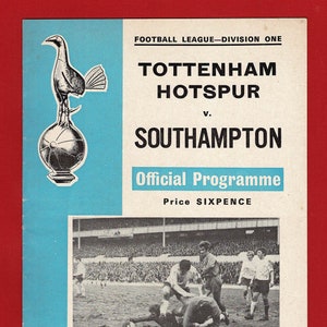 May include: A black and white program cover for a football match between Tottenham Hotspur and Southampton. The cover features the Tottenham Hotspur crest, a cockerel, and a photo of a player scoring a goal. The text on the cover reads "Football League - Division One", "Tottenham Hotspur", "v. Southampton", "Official Programme", "Price Sixpence", "Season 1969-70", "Vol. 62 No. 35", "Saturday, 31st January, 1970", and "Kick-Off 3 p.m."
