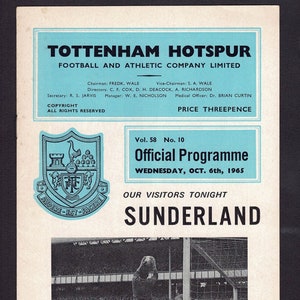 May include: A black and white photograph of a football match between Tottenham Hotspur and Sunderland. The image shows a Sunderland player leaping to head the ball, with a Tottenham Hotspur player attempting to block the shot. The text on the image reads "Vol. 58 No. 10 Official Programme WEDNESDAY, OCT. 6th, 1965 OUR VISITORS TONIGHT SUNDERLAND".