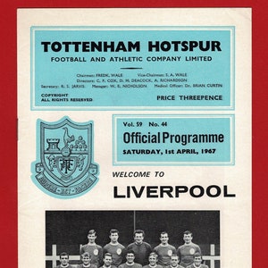 May include: Black and white photo of the Liverpool Football Club team. The team is wearing red and white jerseys and shorts. The players are sitting on a bench with their arms around each other. The team is holding trophies. The photo is from the 1967 season. The text on the photo reads "Our visitors today, Liverpool F.C. Back row (left to right): G. Strong, C. Lawler, T. Lawrence, G. Byrne, T. Smith. Front row (left to right): I. Callaghan, R. Hunt, G. Milne, R. Yeats, P. Thompson, I. St. John, W. Stevenson. Inset. E. Hughes. Photo by Provincial Press Agency, Southport"