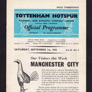 May include: A black and white illustration of a rooster standing on a soccer ball. The text "Our Visitors this Week MANCHESTER CITY" is printed in black at the top of the page. The text below describes the Manchester City football team.