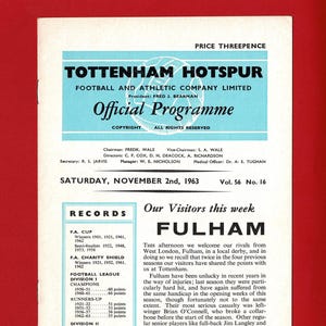 May include: Vintage Tottenham Hotspur football program from November 2nd, 1963, featuring Fulham as the visiting team. The program includes team records, match details, and historical information about the clubs.