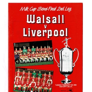 May include: A red program cover for the Milk Cup Semi-Final 2nd Leg match between Walsall and Liverpool. The cover features team photos, a silver trophy, and the match details. The text includes "Official Programme of Walsall Football Club".