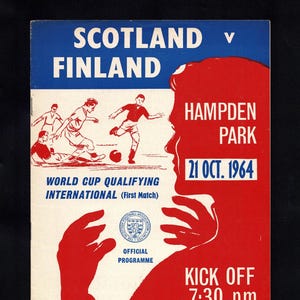 May include: Vintage soccer match program for Scotland vs. Finland, featuring a red and blue color scheme. The program includes illustrations of soccer players, the date, and the location, Hampden Park. The text reads "World Cup Qualifying International".