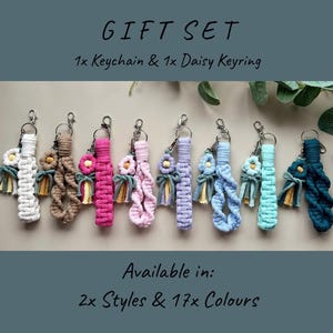 May include: A gift set featuring eight macrame keychains and daisy keyrings in various colours including white, tan, pink, light pink, lavender, light blue, turquoise, and dark teal. Each set includes a knotted wristlet and a daisy charm.