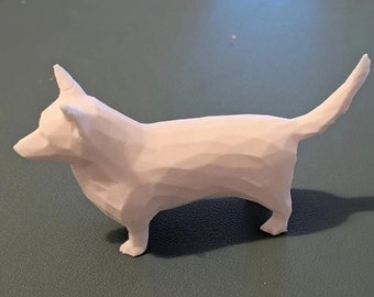 May include: White ceramic figurine of a dog with a stylized, geometric design. The dog is standing with its tail curled up.