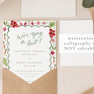 May include: A watercolor wedding invitation with a green, red, and white floral border. The text reads "We're tying the knot!" followed by the names "Catherine Theresa Michaels and Henry Leonard Callum." The invitation also includes the date "06.12.XX" and the location "The Wildflower Hotel, Gardenia, Georgia."
