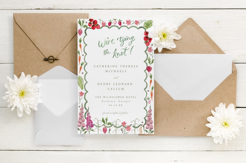 May include: A wedding invitation with a floral border featuring a watercolor illustration of flowers, vegetables, and insects. The text reads "We're tying the knot!" Catherine Theresa Michaels and Henry Leonard Callum. The Wildflower Hotel, Gardenia, Georgia, 04.12.XX.