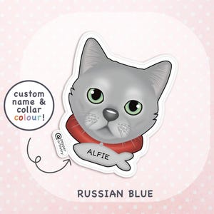 May include: A sticker featuring a stylized illustration of a grey Russian Blue cat with green eyes, wearing a red collar with a fish-shaped tag labeled ALFIE. To the left, a circular text bubble reads custom name & collar colour!