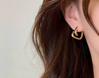 zeitlose Eleganz: Edelstahl Herz-Creolen Ohrringe für zeitlose Romantik