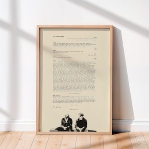 May include: A framed print featuring a beige background with black typewriter-style movie script text from Good Will Hunting. At the bottom, a black and white photograph shows two figures sitting on a bench, capturing a scene from the film.