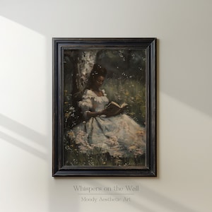 May include: A framed painting of a woman in a white dress sitting in a field of flowers and reading a book. The painting has a dark, moody aesthetic.