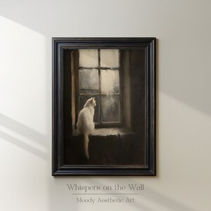 May include: A white cat sits on a windowsill looking out at a rainy day. The painting is framed in black and titled "Whispers on the Wall" with the words "Moody Aesthetic Art" below the title.