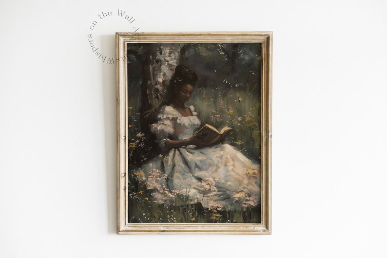 May include: A framed painting of a woman in a white dress sitting in a field of flowers and reading a book. The painting is set against a backdrop of trees and foliage.