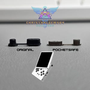 May include: A comparison of two black rubber port covers labelled ORIGINAL and POCKETSAFE, positioned above a white handheld gaming console with a black screen. The logo for CHRISTHALGEM504 CREATIONS is visible at the top of the image.