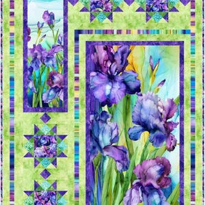 May include: A floral quilt featuring vibrant purple iris blooms against a watercolor background. The quilt has a green and purple border with star-shaped accents. The design includes rectangular and square panels with floral imagery, creating a visually appealing textile.