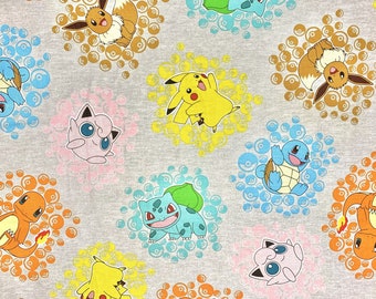 May include: A gray fabric with a repeating pattern of various Pokemon characters, including Pikachu, Bulbasaur, Squirtle, Charmander, and Jigglypuff. The characters are surrounded by blue, pink, yellow, and orange circles.