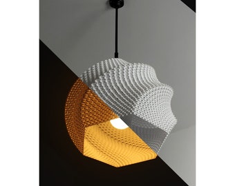 May include: A white and gold geometric pendant light fixture with a textured, honeycomb-like design. The light is hanging from a black cord.