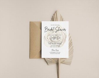 May include: A white bridal shower invitation with a watercolor illustration of a white rose. The text reads "You're Invited! Bridal Shower Honoring Bride to be Georgina Doe Saturday, November 12th, 4:00 PM The Plaza Hotel 768 Fifth Avenue New York, NY 10019 Please RSVP by November 10th, 2023 to (212) 546-5300"
