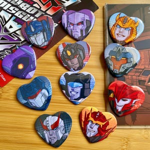 Transformers IDW Heart Buttons
