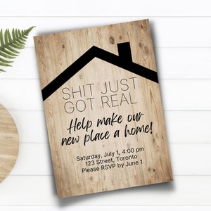 May include: A housewarming party invitation with a woodgrain background and black text. The text reads "Shit Just Got Real. Help make our new place a home!" with the date, time, address, and RSVP information below.
