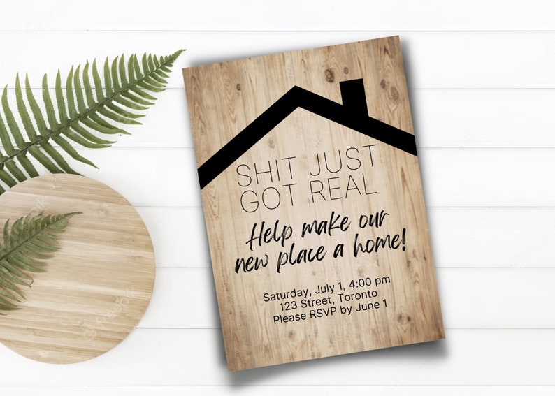 May include: A housewarming party invitation with a woodgrain background and black text. The text reads "Shit Just Got Real. Help make our new place a home!" with the date, time, address, and RSVP information below.