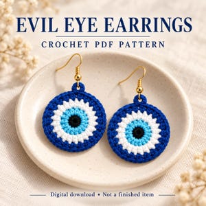 May include: A pair of round crochet earrings featuring an evil eye design with concentric circles of black, light blue, white, and dark blue yarn, attached to gold-tone hooks. The text reads EVIL EYE EARRINGS CROCHET PDF PATTERN. Digital download.