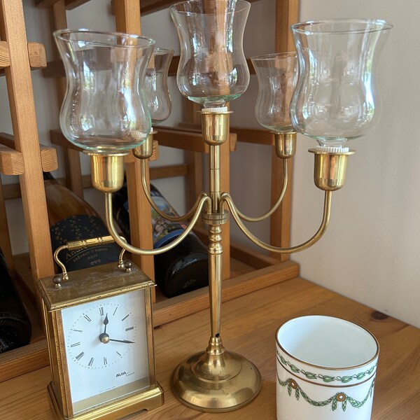 Grand millennial brass effect set, candelabra, carriage clock, and tumbler