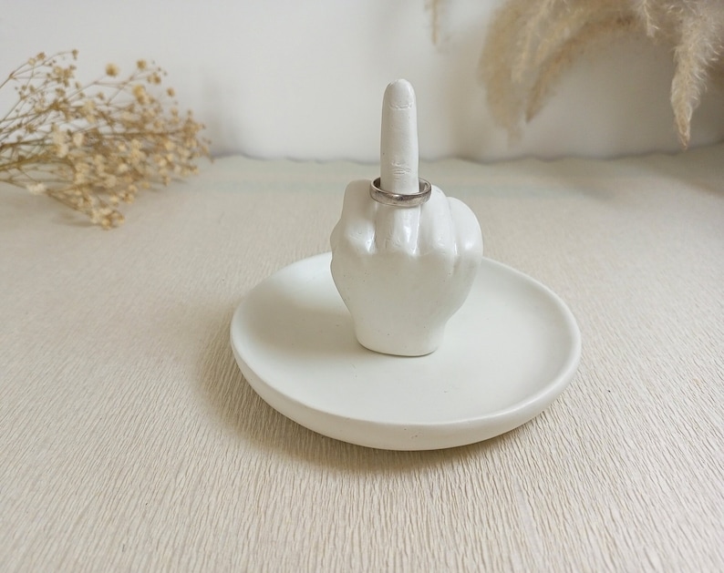 white Middle Finger Ring Holder on tray