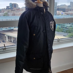 Oakland Raiders parkasjacka storlek large