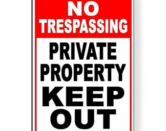 May include: A white sign with a red border and the text "NO TRESPASSING PRIVATE PROPERTY KEEP OUT" in black.