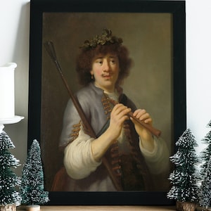 May include: A framed oil painting of a young man playing a flute. He is wearing a blue and gold jacket and a wreath of leaves on his head. The painting has a dark brown frame.