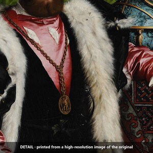 May include: A painting detail featuring a pink satin doublet with white ruffled cuffs, a black velvet overcoat trimmed with white fur, and a gold chain necklace with an oval pendant. The text reads: DETAIL - printed from a high-resolution image of the original.