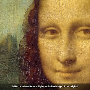 May include: A detailed reproduction of the Mona Lisa painting, focusing on the face and dark hair. The surface shows visible craquelure patterns throughout the oil paint. The text at the bottom reads: DETAIL - printed from a high-resolution image of the original.