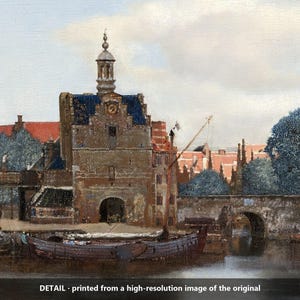 May include: An oil painting depicting a Dutch cityscape with a stone gatehouse, a canal, a wooden boat, and a bridge. The scene features red-roofed buildings, blue-toned trees, and a tall church tower under a cloudy sky. Text reads: DETAIL - printed from a high-resolution image of the original.