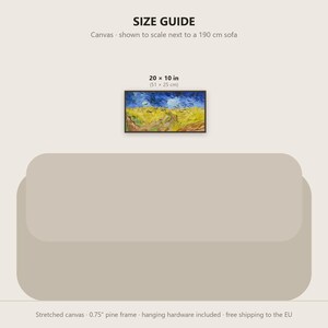 May include: A size guide graphic featuring a rectangular canvas print measuring 20 x 10 inches, displayed above a 190 cm sofa. The artwork depicts a landscape with a blue sky and yellow field. The text reads SIZE GUIDE and 20 x 10 in.