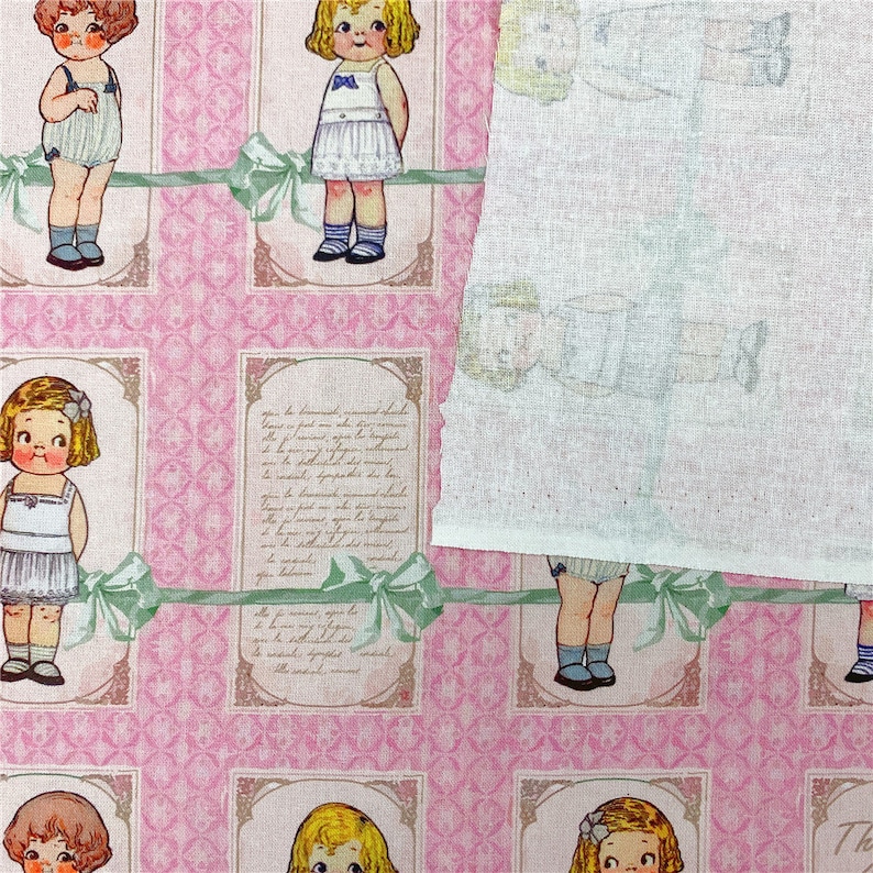 May include: Pink fabric with a repeating pattern of framed illustrations of girls wearing dresses. The girls are all smiling and have blonde hair. The fabric has a vintage feel and would be perfect for crafting or quilting.