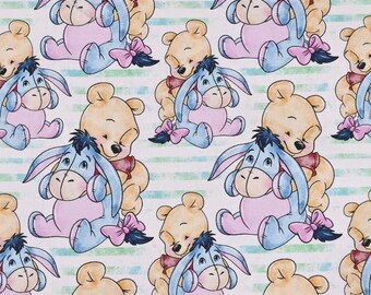 May include: A repeating pattern featuring cartoon illustrations of Winnie the Pooh and Eeyore. The characters are in soft pastel colors, with Winnie in yellow and Eeyore in blue and pink. Each character is adorned with a bow and set against a striped background.