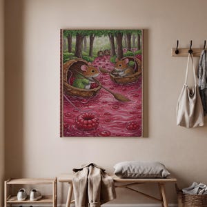 May include: A framed whimsical illustration depicts two mice in walnut shell boats, rowing through a river of red berries. The forest scene features trees and a path, with raspberries floating in the water. The artwork has a warm, inviting color palette.