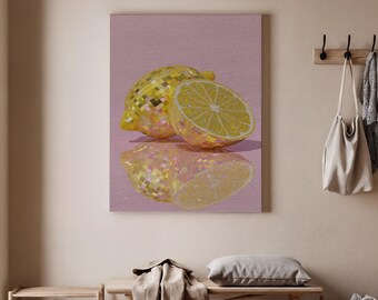 May include: A canvas print featuring a still life of a lemon and a half-cut lemon. The lemons are yellow with a mosaic-like texture, reflecting light. The background is a soft pink, and the image is reflected below.