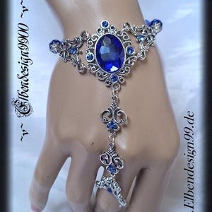 Handsieraden Frans Lily Elbendesign99 Victoriaanse bruidssieraden met saffierblauwe strass steentjes Steampunk Gothic Statement Avantgarde