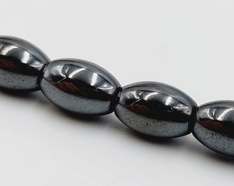 Hematiet Kralen aan Strings (10 mm diameter magnetische bolvormige kralen - Ca. 38 kralen/string) - E6